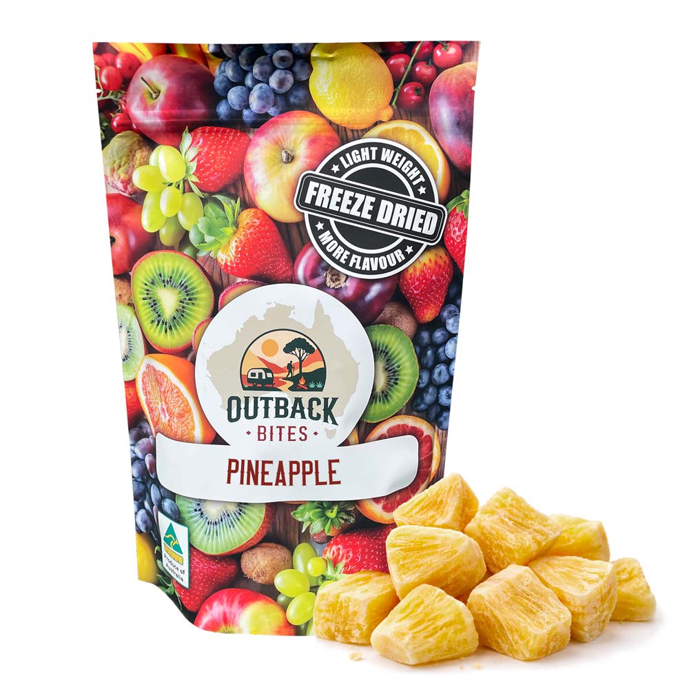 Packaging of Outback Bites Freeze Dried Pineapple with a colorful fruit illustration on a white background.