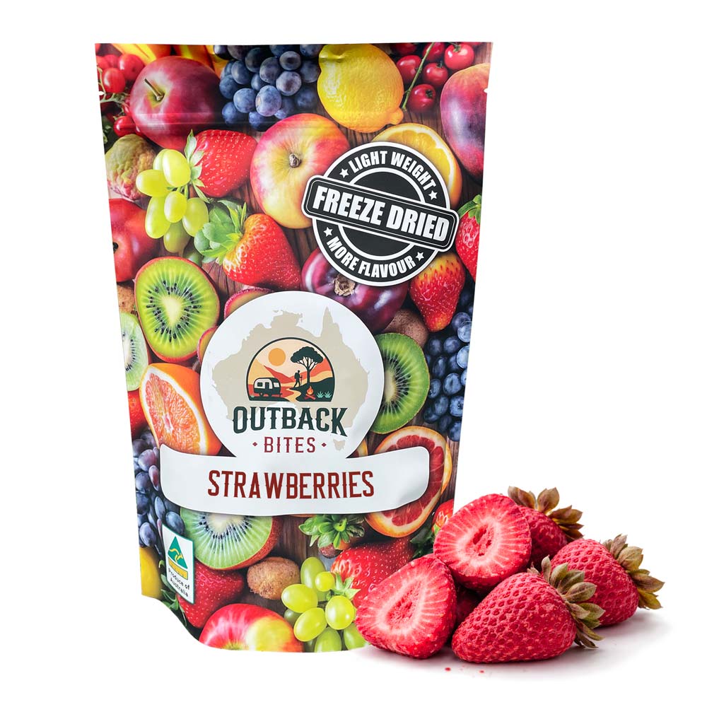 Packaging of Outback Bites freeze-dried strawberries with a colorful fruit design on a white background.