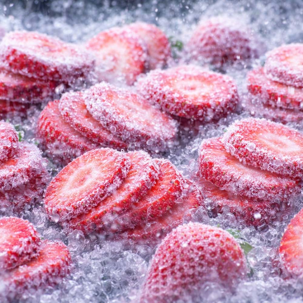 Sliced strawberries being frozen by the freeze-drying process